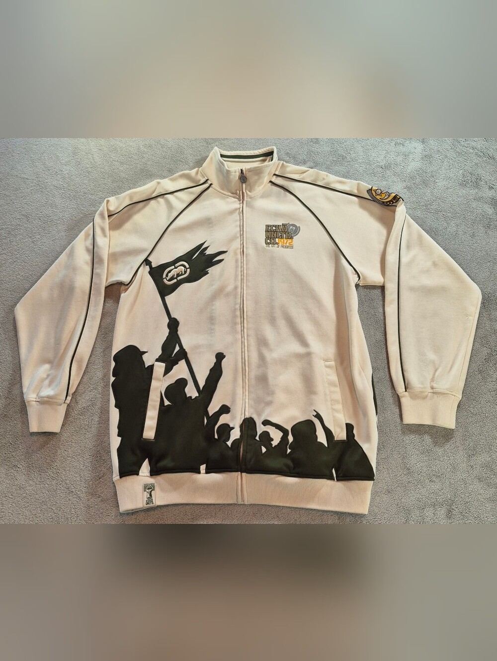 Ecko Unlimited Cream Jacket with Black Crowd Graphic